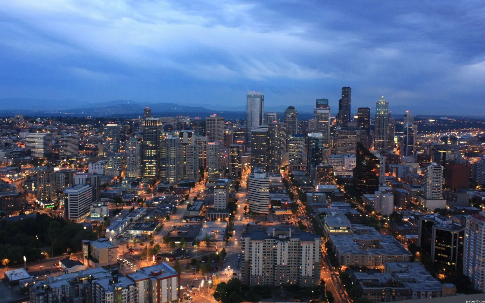 A view of the city at night from above.